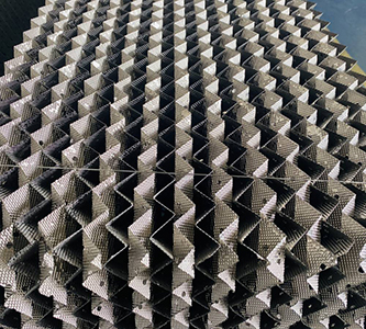 Corrugated Packing for Benzene-Toluene-Xylene (BTX) Separation Columns